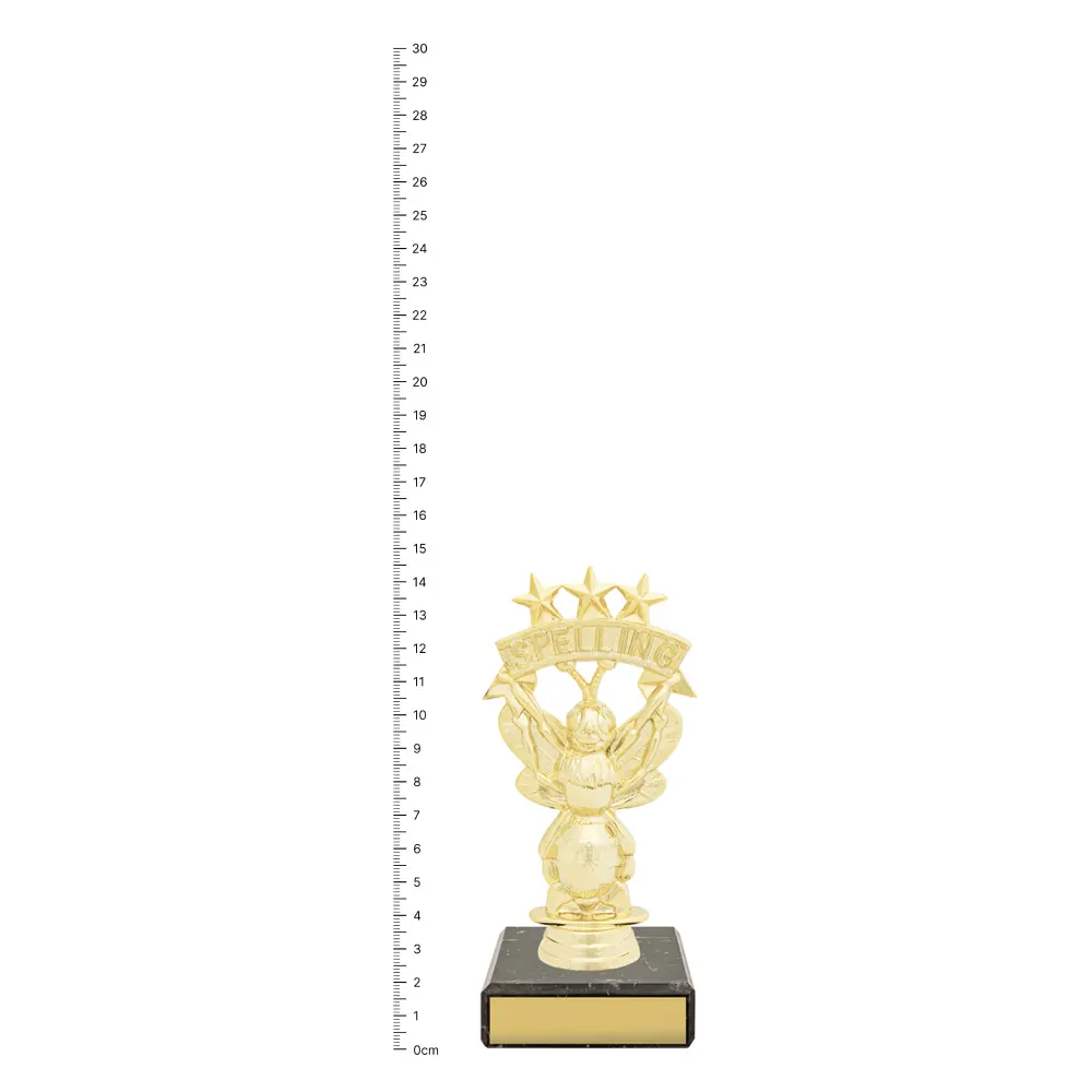 Spelling Bee Figure Trophy next to ruler Spelling Bee Figure Trophy next to ruler