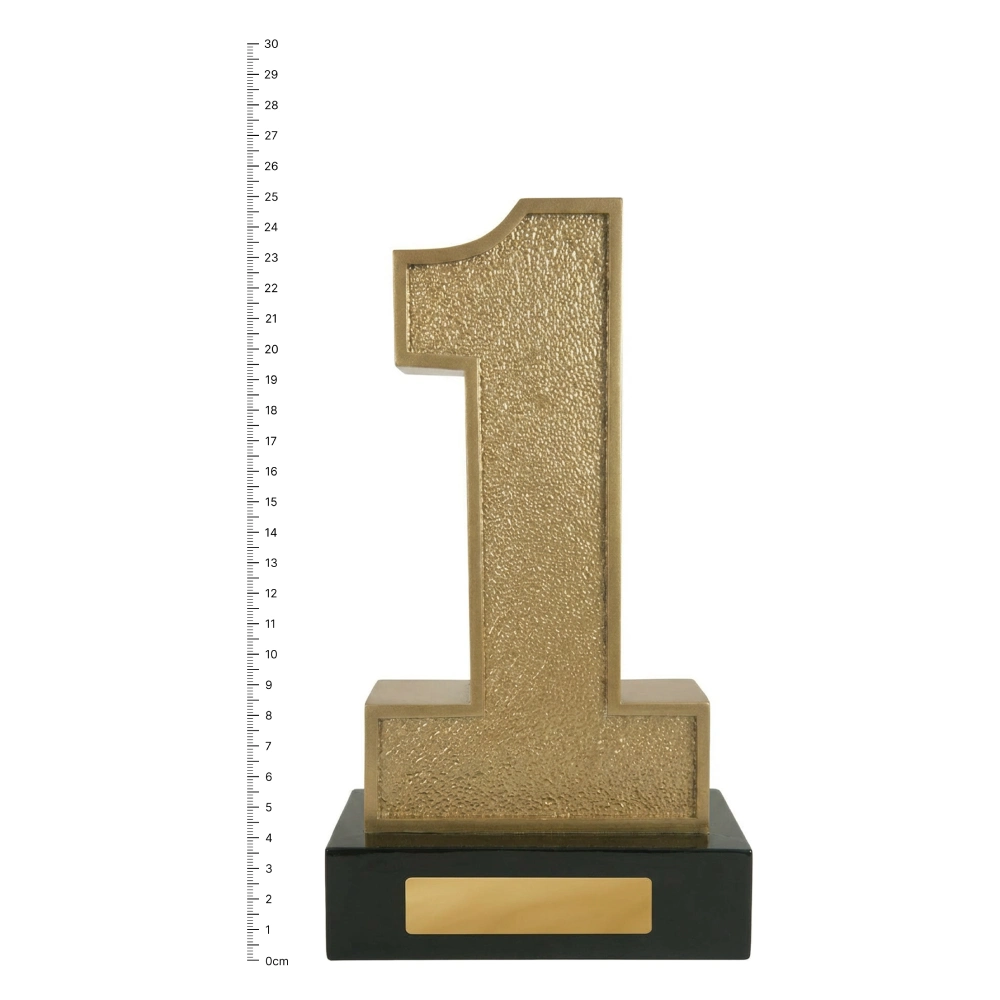 number 1 trophy next to ruler number 1 trophy next to ruler
