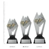 Boot and Ball Shadowcrest trophies next to ruler