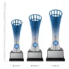 Clarion Cup Silver and Blue Clarion Cup blue and Silver trophies next to ruler