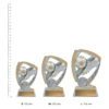 Football Relay Football Relay trophies next to ruler